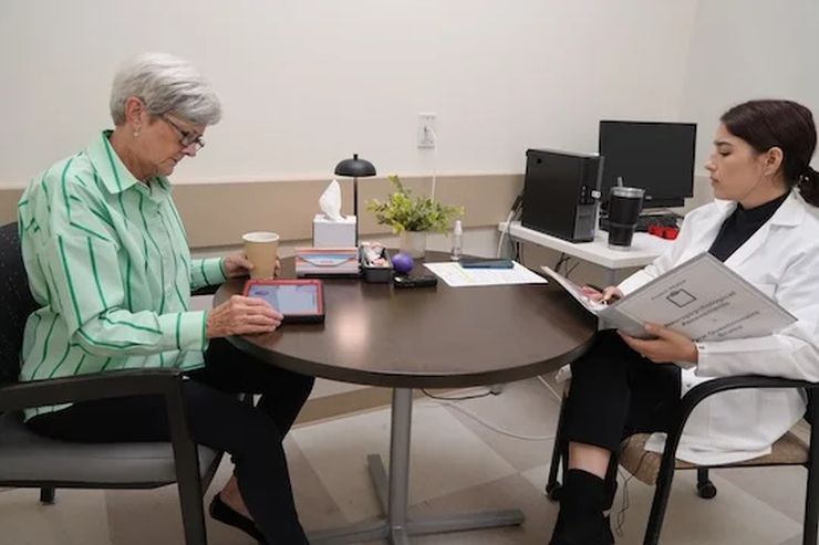 Project REACH participant with RiceUni researcher