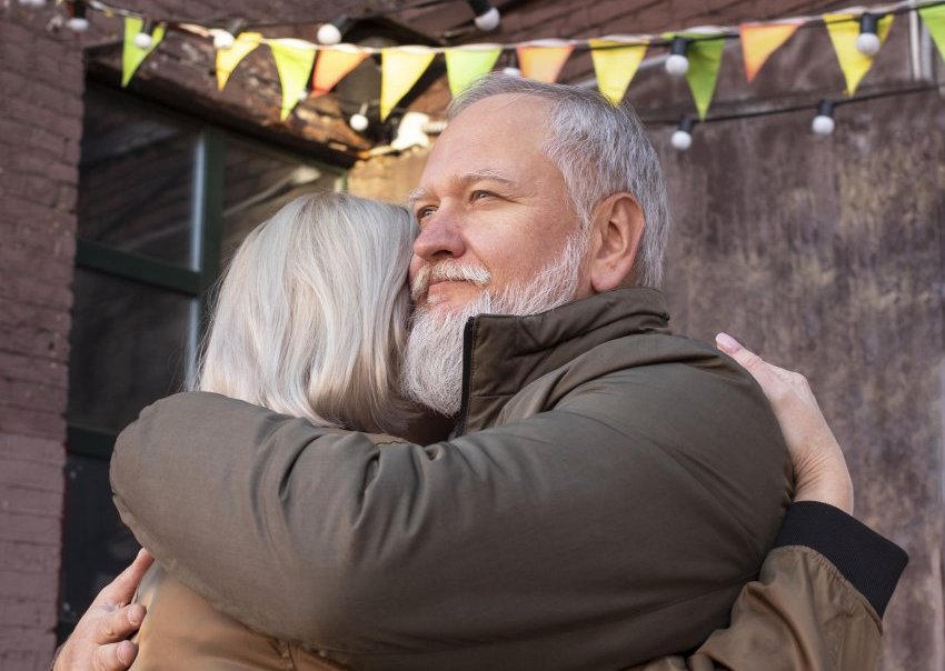 senior couple hugging 