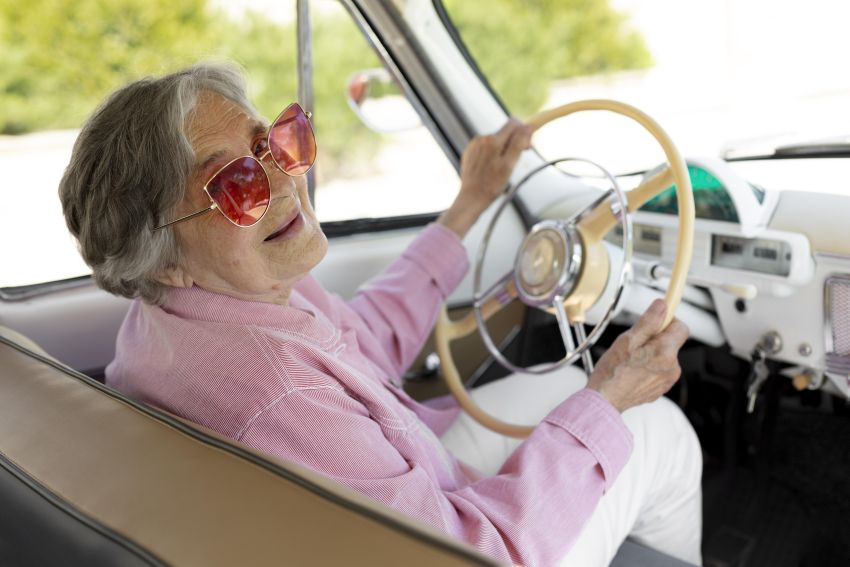 senior woman driving a car 