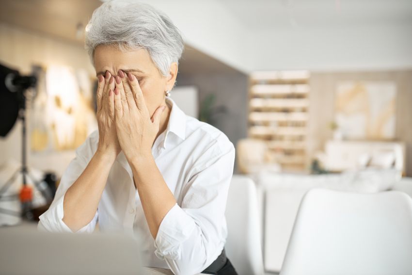 senior woman seemingly stressed 